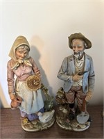 man and woman figurines