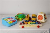 VINTAGE FISHER PRICE ROLLERSKATES AND TOYS