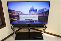 LG 60" TV WITH STAND