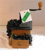 Coffee grinder with removable faux fruit