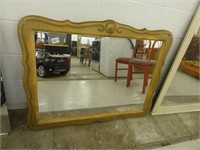 mirror with brown decorative frame