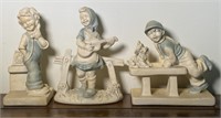 Blue and white children figurines