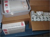 Disposable Gloves & Boxes of  bottled Saline