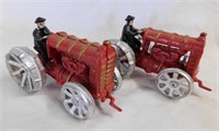2 red cast iron farm tractors w/ drivers, 6" long