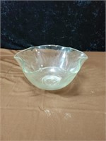 Ruffled colorless glass bowl