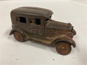 Cast iron 3 inch toy car.