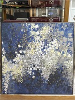 Decorative wall art of blue, gold, and white
