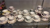 Large Grouping a Beautiful Tea Cups and Saucers