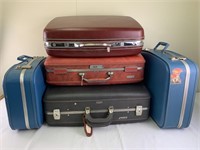 Stack of vintage hard body luggage