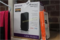 NETGEAR HIGH SPEED CABLE MODEM - CAR CHARGER