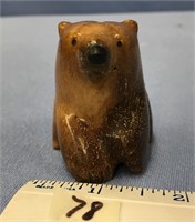 Carved whalebone bear, with inset baleen eyes and