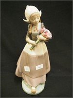 10" Lladro figurine: Dutch girl with flowers