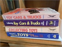 Four toy car and truck collecting books - general