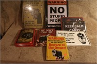Lot of assorted gun related metal signs
