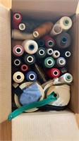 Box of assorted thread
