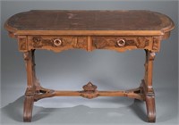 Eastlake style table with leather inlay. 19th cen.
