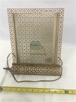 Antique lighted picture frame.