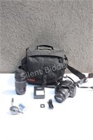 Canon E05 Rebel XS Camera with Lens, Bag