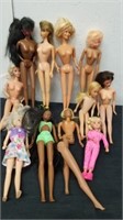 Group of vintage Barbies one does have a detached