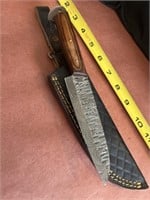 9 inch Damascus, steel knife with leather case,