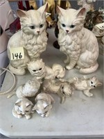 White ceramic cat figurines