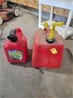 2 PLASTIC GASOLINE CANS W/ PARTIALLY FILLED