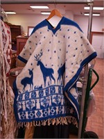 Reversible fringed wool poncho, blue and