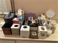 Lot of bathroom items, dispensers, mirror