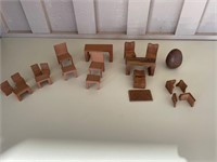 Antique doll and wooden dollhouse furniture