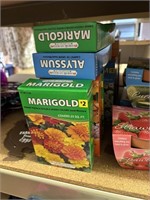 13 boxes of flower seeds, marigold alyssum,