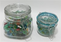 2 Containers Full of Marbles