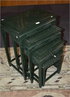 Nest of 4 carved timber side tables,