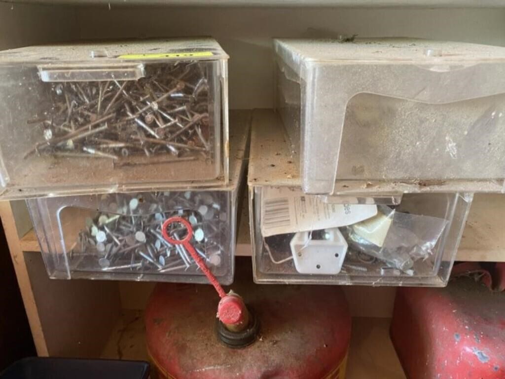 4 plastic containers of screws and nails