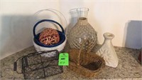 Assorted wicker pieces and vases