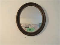vintage framed oval mirror