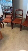 (4) cherry rose back chairs. One arm chair.