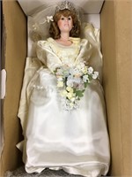 1 doll still in box and a spare doll      (P 78)