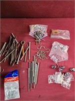 Assorted hardware, bolts, screws, hooks, knows