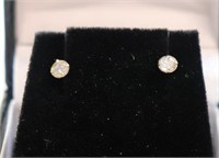 Yellow gold diamond solitaire earrings