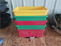 Five plastic tubs