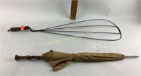 Vintage umbrella, rug beater