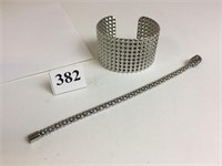 TWO SILVER TONE METAL BRACELETS ONE CUFF ONE