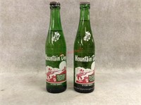Pair of vintage Mountain Dew bottles