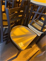 7 off white or pale yellow plastic seat chairs