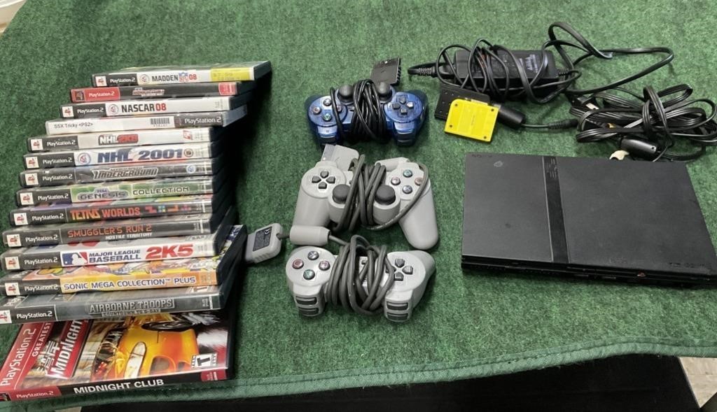 PlayStation 2 console and games with controllers
