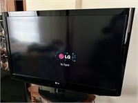 LG TV on Swivel pedastal stand (42")