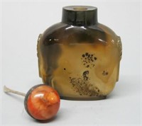 POLISHED AND CARVED STONE SNUFF BOTTLE