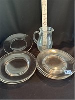 SIX 7 1/2" SALAD PLATES AND GLASS PITCHER - MADE