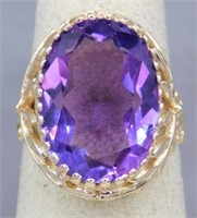 10K RING WITH 7.00 CT AMETHYST. SIZE 7. 6.8
