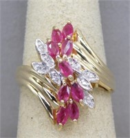 10K RING WITH 1.00 CTTW RUBIES AND DIAMONDS. SIZE